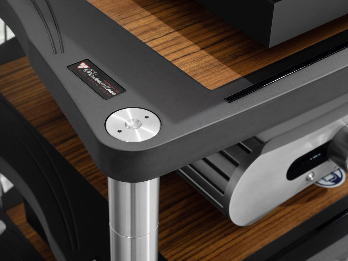 Precision-engineered audio equipment rack used in a luxury home cinema system.